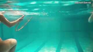 Babes swim strip and have fun underwater