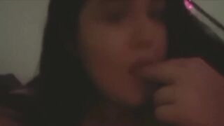 Cute baby Mariana takes her fingers deep in her mouth and sucks them properly