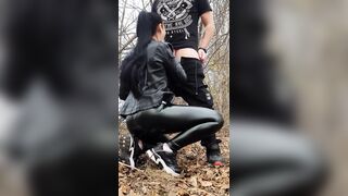 Ponytail Girl in a Leather Outfit Sucks Cock in the Forest and Takes Cum on Her Face - Vertical Vid
