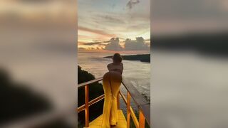 Bending over watching the sunset