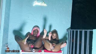 2 girl pussy play on the balcony