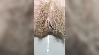Long haired pussy pissing in the morning close up with a delicious fart