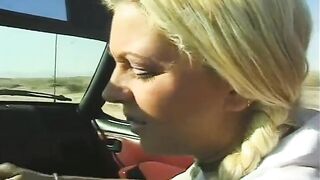 Blonde stretched out and pussy penetrated outdoors in her own car