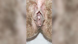 Delicious big hairy pussy pissing from urethra close up