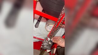 Loud pregnant submissive chained in garage to moving trolley - wand taped to her clit and cums hard