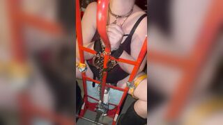 Loud pregnant submissive chained in garage to moving trolley - wand taped to her clit and cums hard